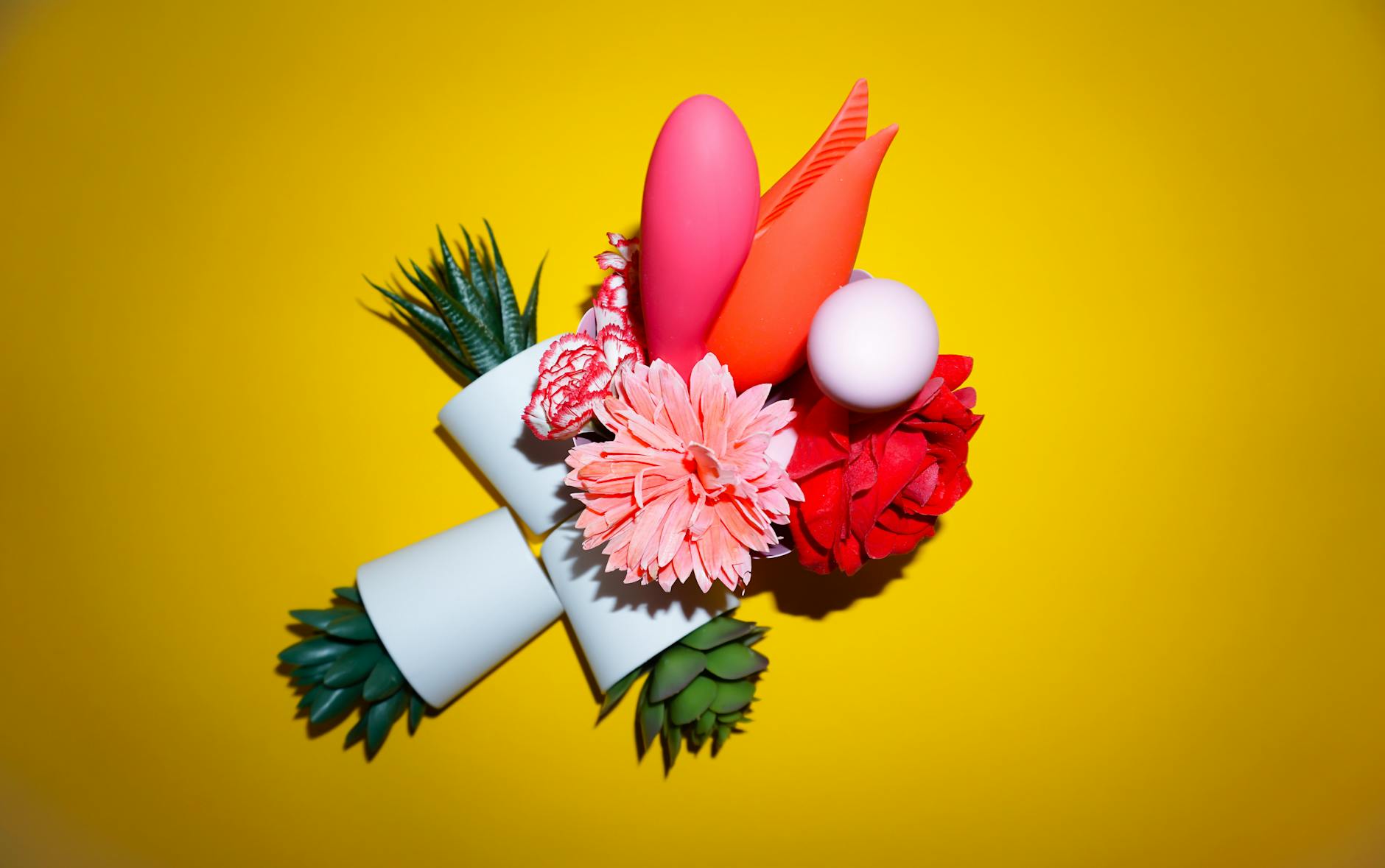 Colorful lemon and flowers on a bright yellow background, symbolizing renewed joy and vitality